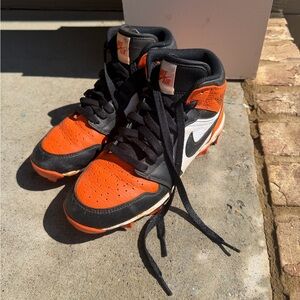 Jordan’s 1 football cleats orange and black